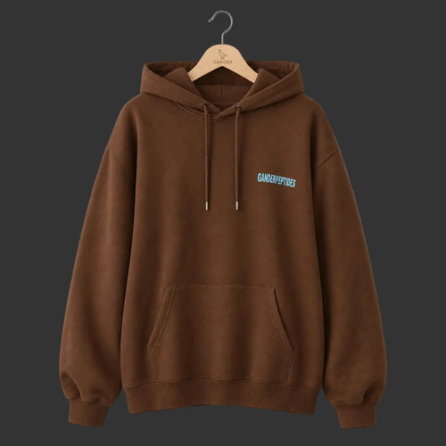 Brown Gander Peptides oversized hoodie front on a Gander wooden hanger