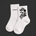 Cowboy Gander white crew socks on a charcoal background with no wooden elements