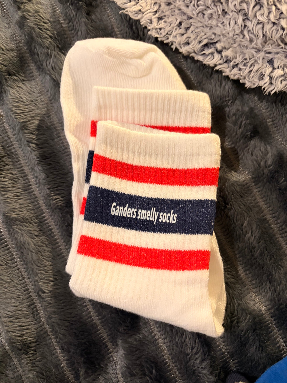 Original photograph of Gander’s Smelly striped crew socks