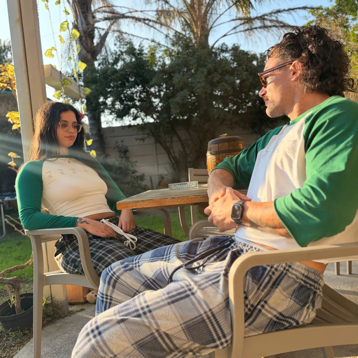 Women’s and men’s green Goosey baseball tees in the original editorial