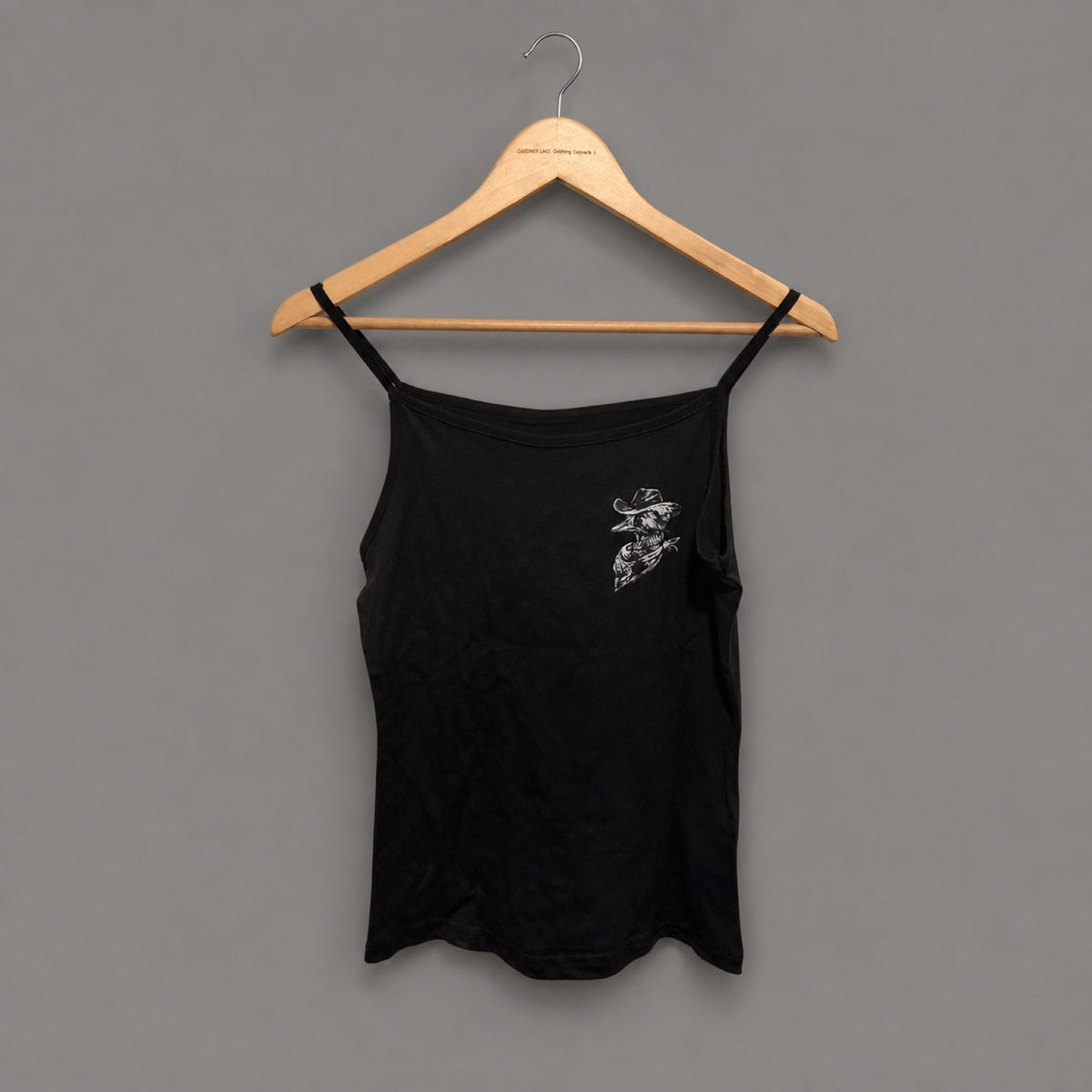 Goosey Couture black printed strappy top front on a Gander wooden hanger