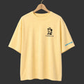 Yellow Gander LTD oversized tee front on a Gander wooden hanger